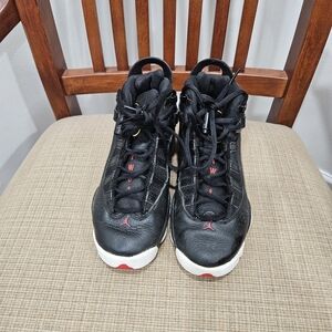 Boys Black and White High-Top Jordans Size 4Y